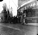 View: s03171 High Street (bottom of Fargate) decorated for the royal visit of King Edward VII and Queen Alexandra, No 10-16, William Foster and Son, Tailors, Foster's Buildings in background