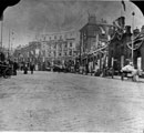 View: s03191 High Street decorated for the royal visit of King Edward VII and Queen Alexandra, Fitzalan Market, right