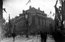 View: s03240 High Street decorated for royal visit of King Edward VII and Queen Alexandra, Cole Brothers, department store in background