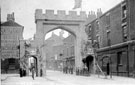 View: s03353 Decorative arch on West Street for the royal visit of King Edward VII and Queen Alexandra showing (right) Nos. 112 - 114 Ward and Payne, tool manufacturers