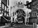 High Street/Market Place (outside George Hotel, left), decorated for the royal visit of Prince and Princess of Wales (later became King Edward VII and Queen Alexandra)