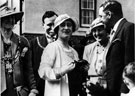Royal visit of the Duchess of York to Painted Fabrics, Meadowhead.  The Lord Mayor, Fred Marshall, is behind the Duchess, and Captain Lionel Scott of Painted Fabrics is on right of the photograph. Group standing in front of the Haigh Memorial Homes.