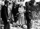William Edwards, President of the Horticultural Society presenting a stainless steel fork to the Duchess of York at Deep Pits Allotments, City Road, Park, with Lord Mayor, Fred Marshall