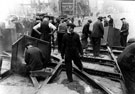 Repairing tram tracks at Fitzalan Square after air raids during World War II