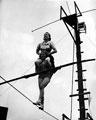 Elsie Davis walks a tight wire 50 feet high