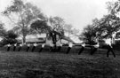 The Totley Tug O War team in a field behind Cannon Hall, Totley