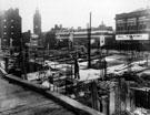 View: s05167 City Hall, under construction, looking towards Regent Cinema, centre and Albert Hall, right, Barker's Pool. Opened 1932. Containing 6 halls, named the Oval, Memorial, Mezzanine, North, Central and South