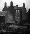 Unidentified three storey house and pigsties, possibly central Sheffield