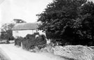 Old cottages, Nos 54 and 56, Norton Lees Lane, looking towards Norton Lees Road junction. Situated opposite Lees House, next to St. Paul's Church. Cutting on right led to a water pump. Demolished to make way for Norton Lees Garage