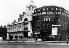 View: s08046 Cinema House, Fargate, later became Barker's Pool, Nos. 66, 68 and 70 Leopold Street, A. Wilson Peck and Co. Ltd., Music Warehouse, right, Queen Victoria Monument in foreground