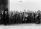 Men outside the Durham Ox public house, No. 15 Cricket Inn Road, before a trip to Doncaster