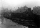 Construction of building at the side of the River Don between Lady's Bridge and Blonk Street, photographed from where the River Don meets the River Sheaf (at rear of photographer)