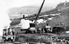Construction of Howden Dam, shunting rubble at Birchinlee 	