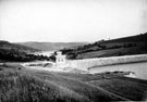 Broomhead Valve Tower and overflow weir, showing More Hall Reservoir in distance