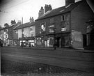 Derelict shops, Harvest Lane at the junction with Malthouse Lane