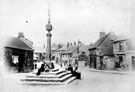 Woodhouse Market Cross, Market Square, looking towards Market Place. Cross Daggers Inn, No 14, Market Square on right. The cross was erected in 1775 by Joshua Littlewood. A sun dial and weather vane were added in 1826