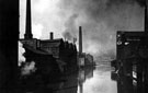 View: s12216 River Don from Lady's Bridge before the First World War. Tennant Brothers Ltd., Exchange Brewery on left (fronting Bridge Street), Millsands Steelworks beyond and Cocker Brothers Wireworks across the river (on right)