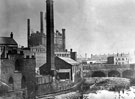 View: s12220 River Don from Lady's Bridge, No. 2 The Wicker, Wicker Tilt also known as Huntsman's Forge, occupied by Benjamin Huntsman, tilter, and Wards, Blonk and Co., foreground, left. Blonk Street Bridge in near distance, Tower Grinding Wheel in background
