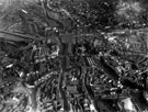 View: s12354 Aerial view-City Centre including (left-right) Snig Hill, Bank St to Castle St, Campo Lane and High St in foreground, River Don, Corn Exchange, Castlefolds Market, Norfolk Market Hall and Sheaf St, centre, Park Station,Canal basin and City Station, b