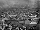 View: s12424 Aerial view - Manor Estate roads including Prince of Wales Road, City Road and Woodhouse Road (bottom of picture) showing Common Farm (bottom) and St. Swithun's Church