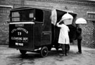 1&cent; ton electricar refuse collection lorry No. 75 emptying the bins