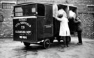 1¢ ton Electricar Refuse Collection Lorry No. 75, Registration No. WE 400, emptying the bins