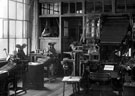 Interior of Sheffield Corporation Printing Department - Part of the mechanical typesetting equipment showing two of the monotype keyboards and one of the Intertype Machines, with the Monotype Casting Room in background