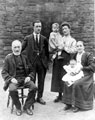 Members of the Oxley Family with grandparents seated