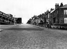 Andover Street at the junction of Brunswick Road with St. Catherine's School top of photograph
