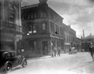 View: s12956 Arundel Street with the junction with Sycamore Street, No. 13 Adelphi public house, No. 15 Corporation Planning Dept. and Nos. 33 - 37 John May (Sheffield) Ltd., Vulcan Works, cane furniture and basket makers, in background
