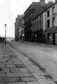 Tudor Way, formerly Arundel Street, looking towards Norfolk Street, prior to demolition, premises include derelict No 75, Gilberts (Hull) Ltd., radio distributors, No 71, Talbot Hotel and former School of Art and Design