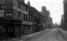 Arundel Street at the junction of Arundel Lane, looking towards Howard Street, premises include Nos. 33 - 37 John May (Sheffield) Ltd., basket makers, Vulcan Works, College of Technology in background