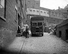 Arundel Lane - Refuse collecting at John May (Sheffield) Ltd., Vulcan Works, basket makers, looking towards Lyceum Theatre, Arundel Street Arundel Lane - Refuse collecting at John May (Sheffield) Ltd., Vulcan Works, basket makers, looking towards Lyceum Theatre, Arundel Street