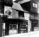 View: s13052 Snig Hill, left-right, No. 72 hairdressers and tobacconist belonging to Joe Turner, No. 70 oyster dealer belonging to Harry Fox