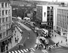 Elevated view of Angel Street and Market Place, Nos. 51 - 57 Peter Robinson Ltd., department store and Hornes, tailors with (right) the Vulcan Sculpture by Boris Tietze