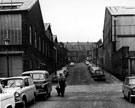 Atlas Street from Forncett Street looking towards Earsham Street, H. Polan and Co. Ltd., lead pipe works (right)