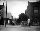 Demolition of Nos. 870 - 872 Attercliffe Common and Brightside and Carbrook Co-op, Kirkbridge Road with a Black Cat Cigarette vending machine extreme left of picture