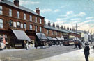Attercliffe Road showing shops including No. 545 Wm. Jn. King, provision dealer and Tram No. 104 and horse drawn carrriages