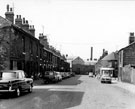 Housing and corner shop, Baldwin Street looking towards John M. Moorwood Ltd., iron founders, Eagle Foundry and Marple and Gillott, Arnold Works , Stevenson Road, with the junction of St. Charles Street visible, Attercliffe