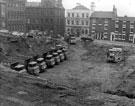 View: s13241 Bank Street, excavations for Churchill House, Meetinghouse Lane with Hoole's Chambers on left, Wharncliffe House in background (white building)
