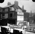 Barkers Pool during the demolition of buildings to make way for the War Memorial, White Lion Hotel, left