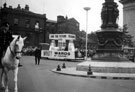 View: s13312 Barkers Pool showing float decorated by Thomas W. Ward in a parade