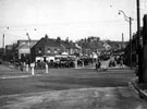 Shops including Priestley and Styan, (C.E. Styan Ltd.) bakers, E. Friedrich and Son, pork butchers, Jsph. H. Watson, butchers, Bellhouse Road looking across from Hucklow Road with Sicey Avenue and S.Y.D. Laundry (top of hill) in view