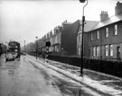Traffic on Bellhouse Road, Shiregreen from above Primrose Avenue, showing Council and terraced housing with pedestrian entrance to English Steel Corporation Sports Ground between Traffic on Bellhouse Road, Shiregreen from above Primrose Avenue, showing Council and terraced housing with pedestrian entrance to English Steel Corporation Sports Ground between