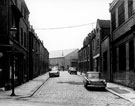 Beverley Street looking from Mrs. J. Saunders' corner shop and Attercliffe Library, Leeds Road towards Bootle Street, showing Attercliffe Victory Club (left), Tartar Press, printers (right) and Gregory and Taylor, engineering supplies (Worksop Road) 
