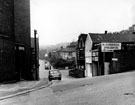 Bolsover Road East looking across from Hind House Lane to Bolsover Road showing Mrs. A Hall, 's dressmaking premises and B. and P. Russell, building contractor