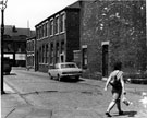 Beverley Street looking towards the Boston shoe Company's shop, Attercliffe Road Liberal Club and Institute on the right 	