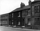 View: s13701 Bramall Lane, No. 32 Queen Adelaide Hotel, No. 36 W.F. Caudle, upholsterer, No. 38 William Lindley, No. 40 Mary Wilson and Remploy Ltd., engineers