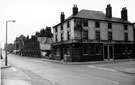 Cricketers' Arms, No. 106 Bramall Lane at junction of John Street. Demolition of back to back housing in background