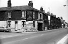 View: s13710 Bramall Lane at junction of Randall Street, James Fairley and Sons Ltd., steel manufacturers. Demolition of back to back housing in background